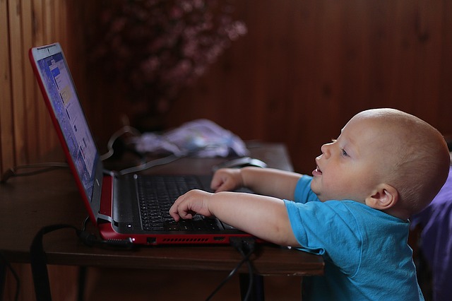 Baby using a laptop